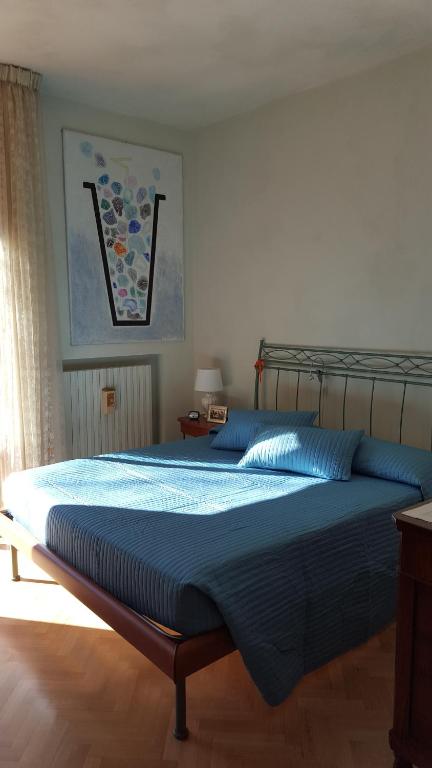 Postel nebo postele na pokoji v ubytování B&B Un mare di Gioia