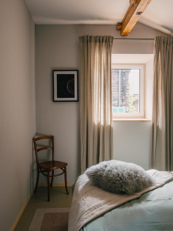 Postel nebo postele na pokoji v ubytování Locanda del Viandante by Heima