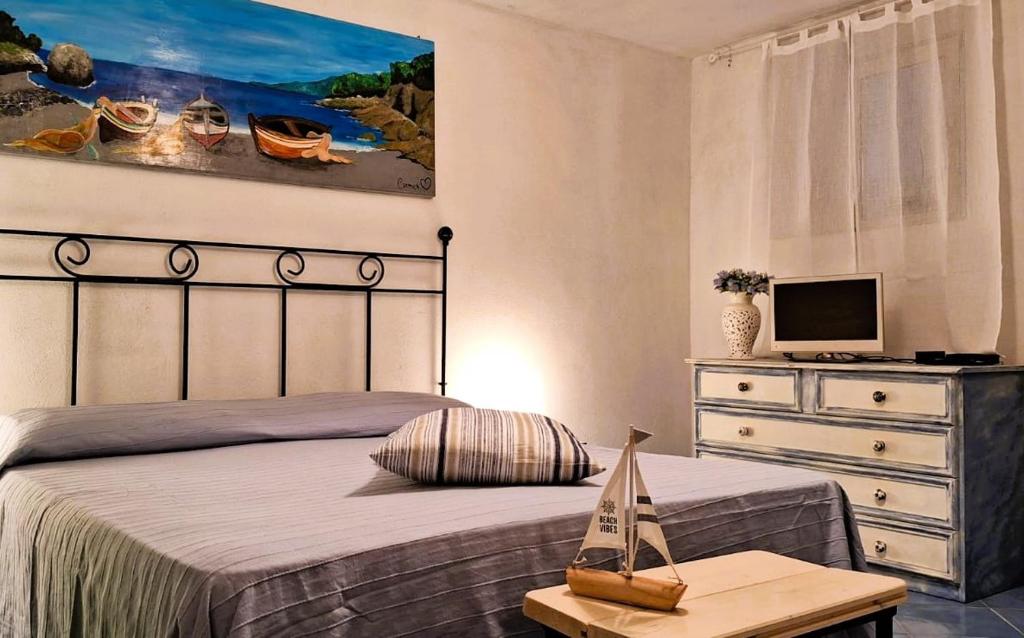 Postel nebo postele na pokoji v ubytování TreMetriSopraAlMare