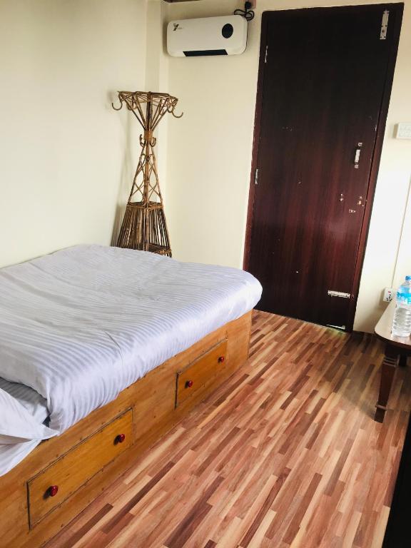 Postel nebo postele na pokoji v ubytování Mita Hotel