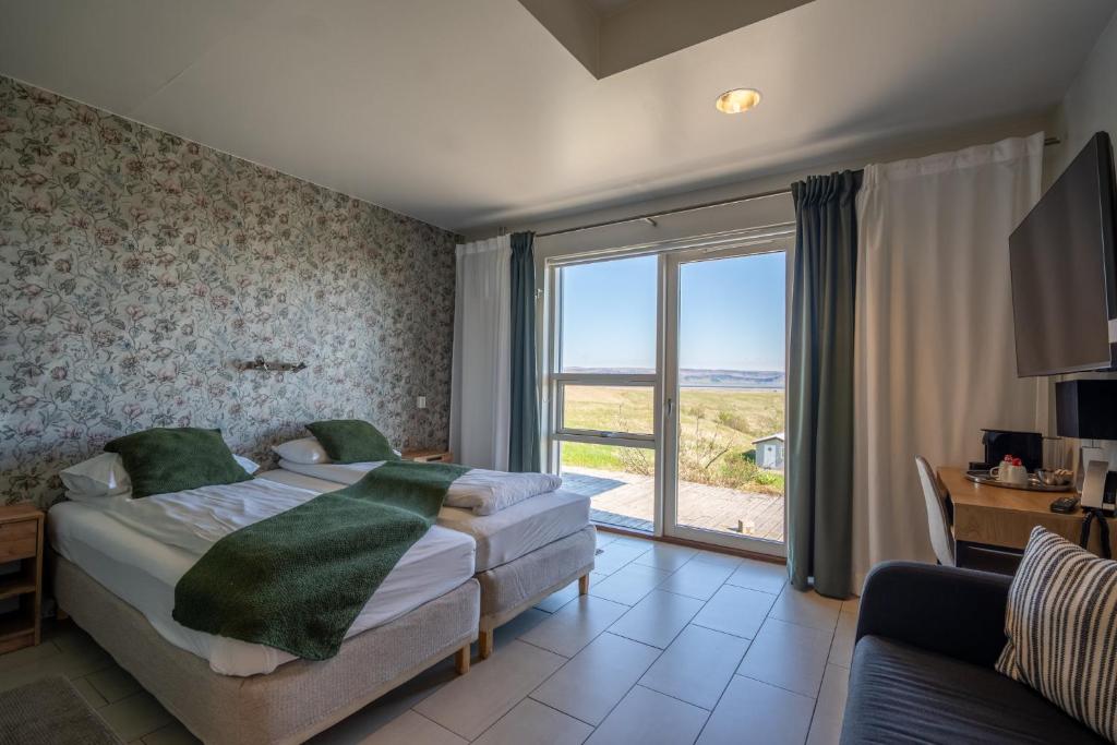 Postel nebo postele na pokoji v ubytování Hotel Laki