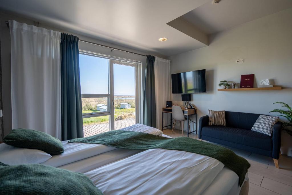 Postel nebo postele na pokoji v ubytování Hotel Laki