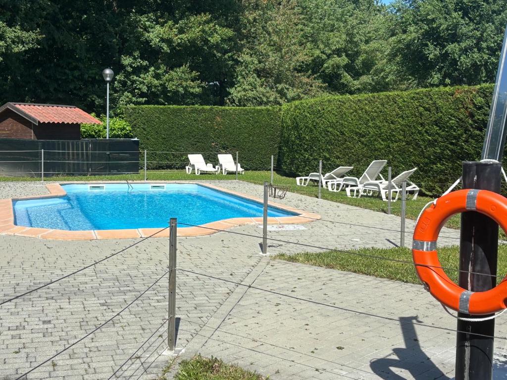 Bazén v ubytování Albavillage Hotel Wellness & Camping nebo v jeho okolí