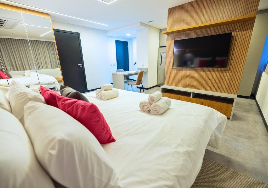 Postel nebo postele na pokoji v ubytování Urbà Home Stay by Housi