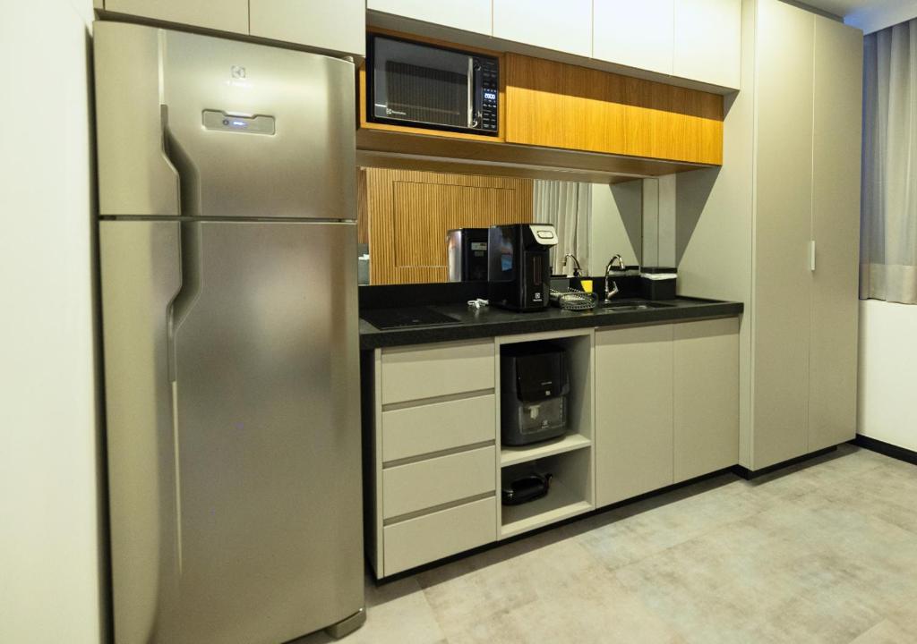 Kuchyň nebo kuchyňský kout v ubytování Urbà Home Stay by Housi