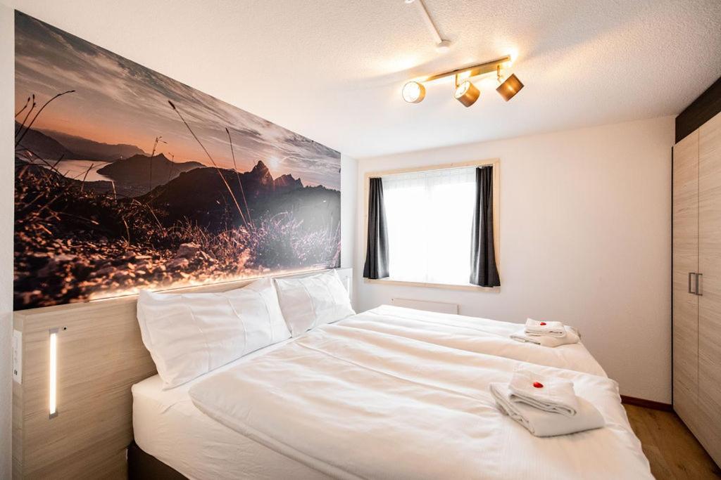 Postel nebo postele na pokoji v ubytování Roggenstock Lodge