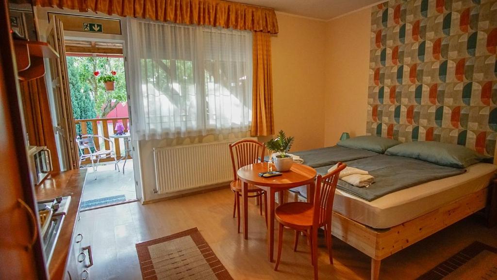 Postel nebo postele na pokoji v ubytování Zam-Zem Holiday Apartman