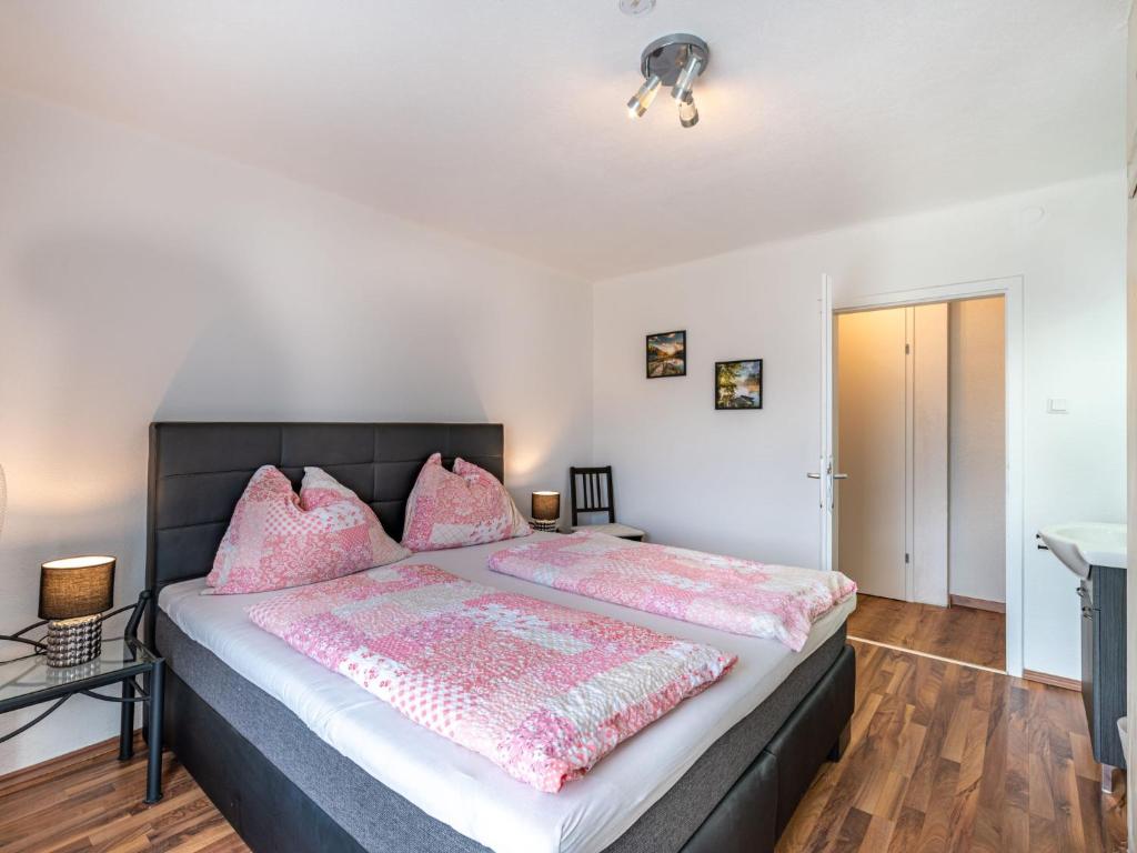 Posteľ alebo postele v izbe v ubytovaní Apartment Ogris-1 by Interhome