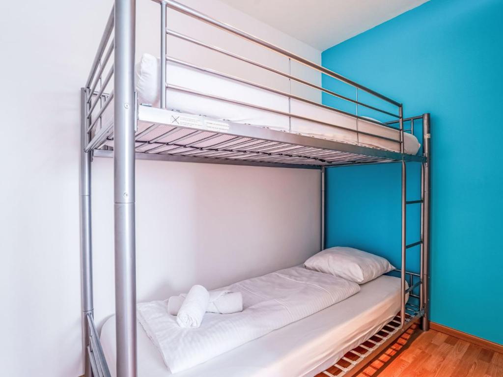 Postel nebo postele na pokoji v ubytování Apartment Residentie Irena app-302 by Interhome