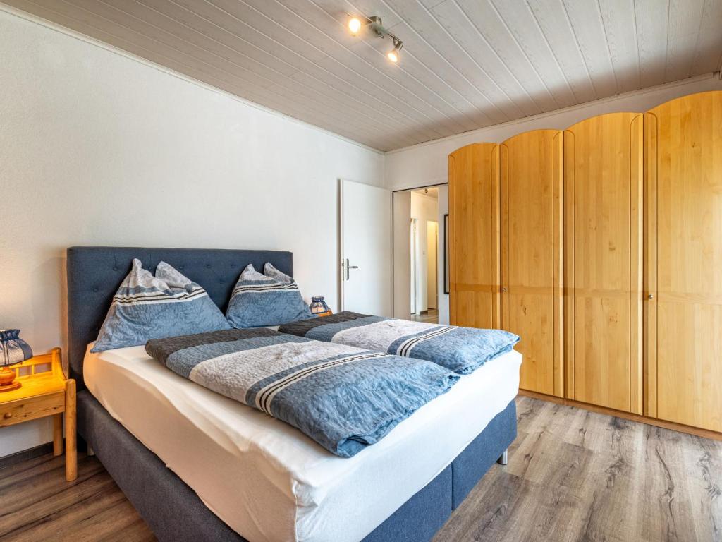 A bed or beds in a room at Apartment Ogris-2 by Interhome