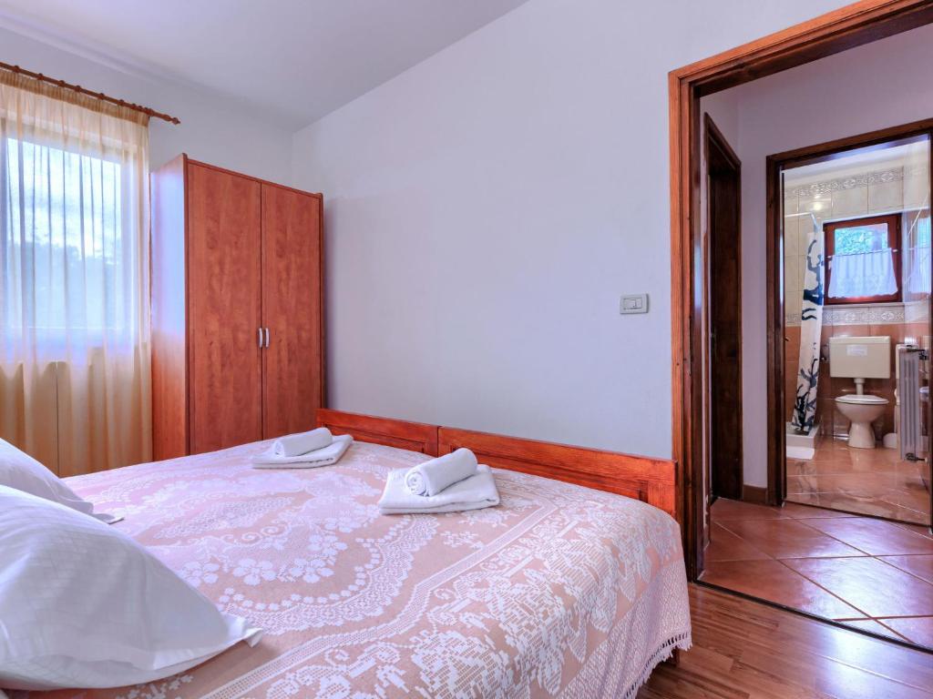 Posteľ alebo postele v izbe v ubytovaní Apartment Ivan & Tina-2 by Interhome