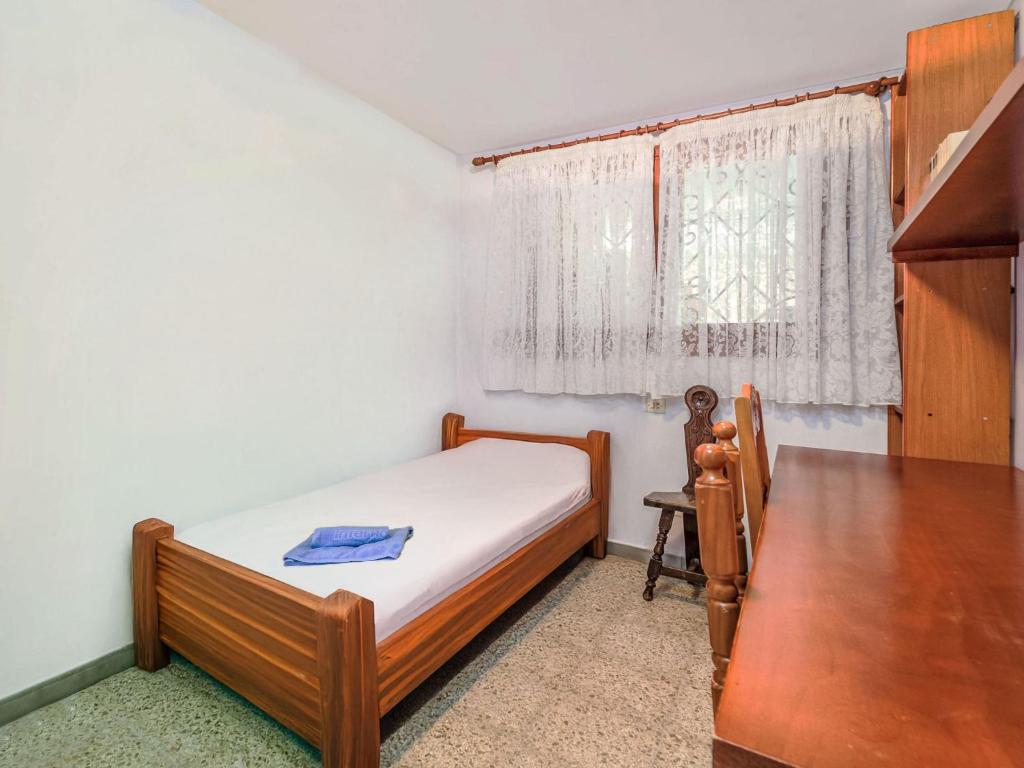 Posteľ alebo postele v izbe v ubytovaní Holiday Home Cala Llorell-1 by Interhome