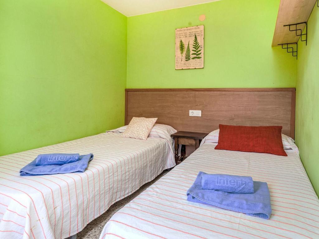Posteľ alebo postele v izbe v ubytovaní Holiday Home Cala Llorell-1 by Interhome