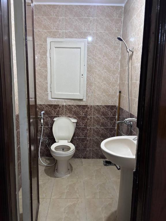 Koupelna v ubytování Noor Hotel