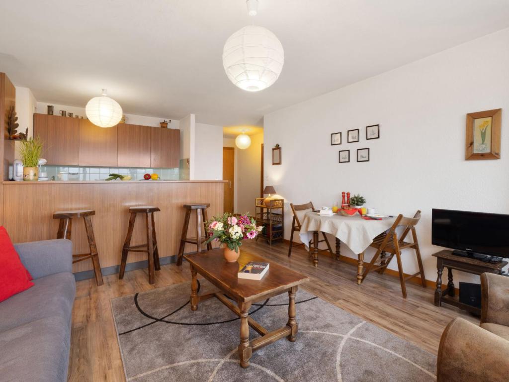 TV a/nebo společenská místnost v ubytování Apartment Bruyères A32 by Interhome