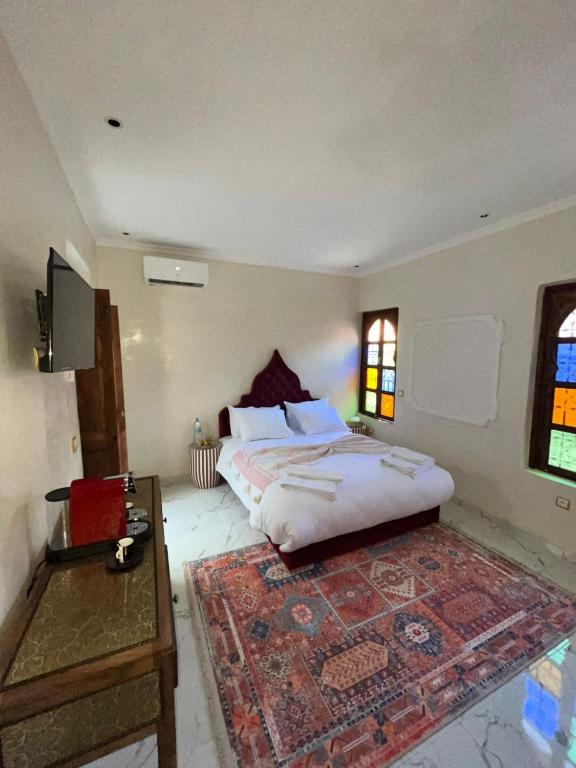 Postel nebo postele na pokoji v ubytování Riad Abrare
