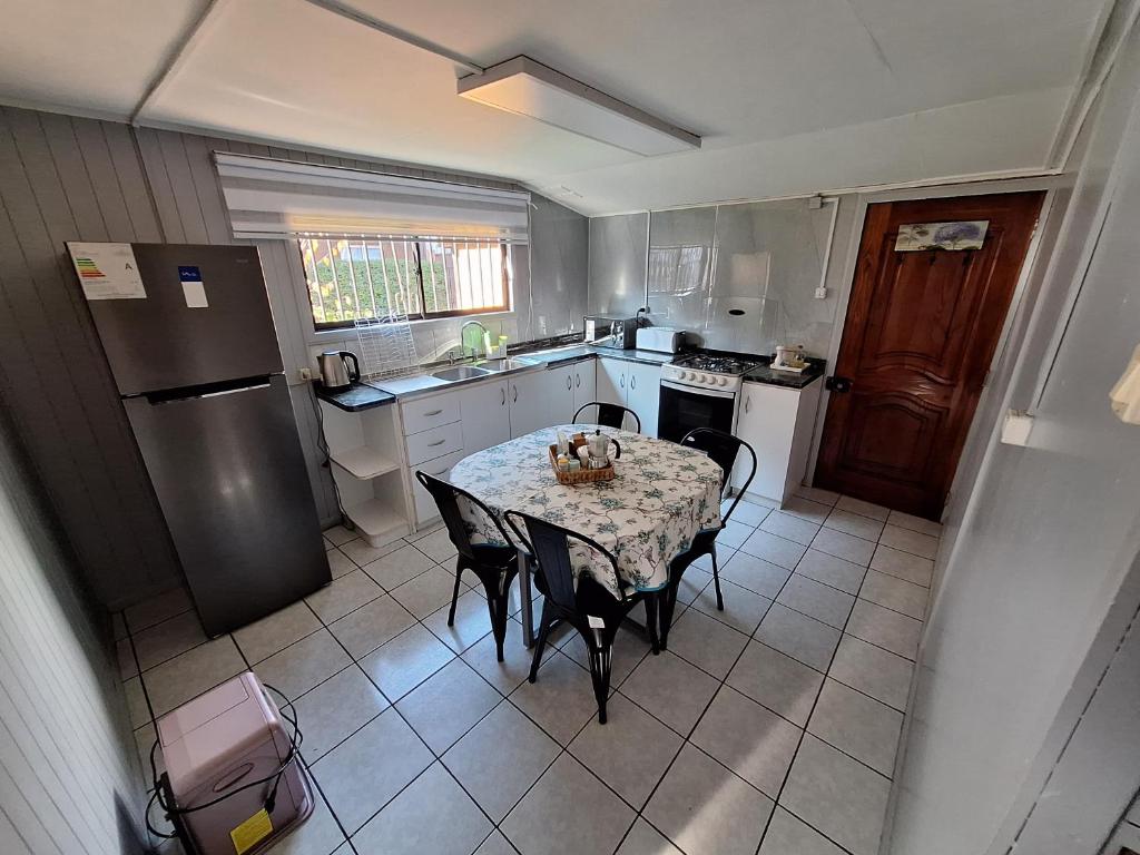 Una cocina o cocineta en Amplia Casa Totalmente Equipada