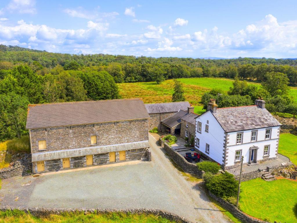 an aerial view of a house and a building at Grove House in Grange Over Sands