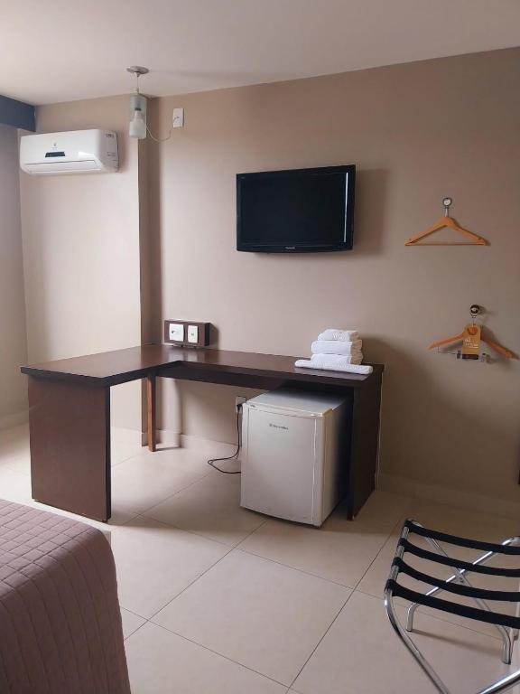 TV a/nebo společenská místnost v ubytování Hotel Dunamys Curitiba