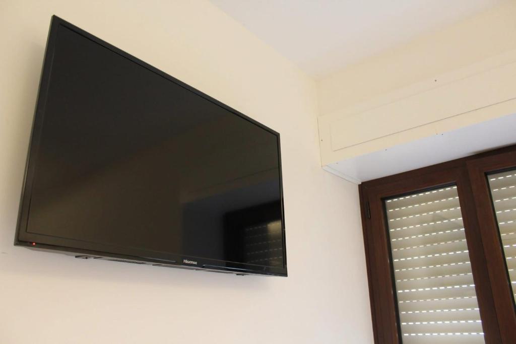 TV a/nebo společenská místnost v ubytování BrezzaMarina