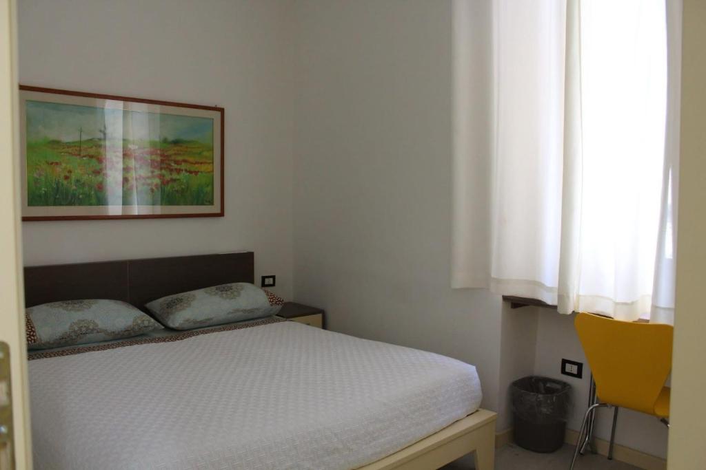 Postel nebo postele na pokoji v ubytování BrezzaMarina