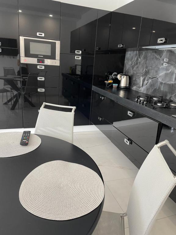 Kuchyň nebo kuchyňský kout v ubytování Casa M&N