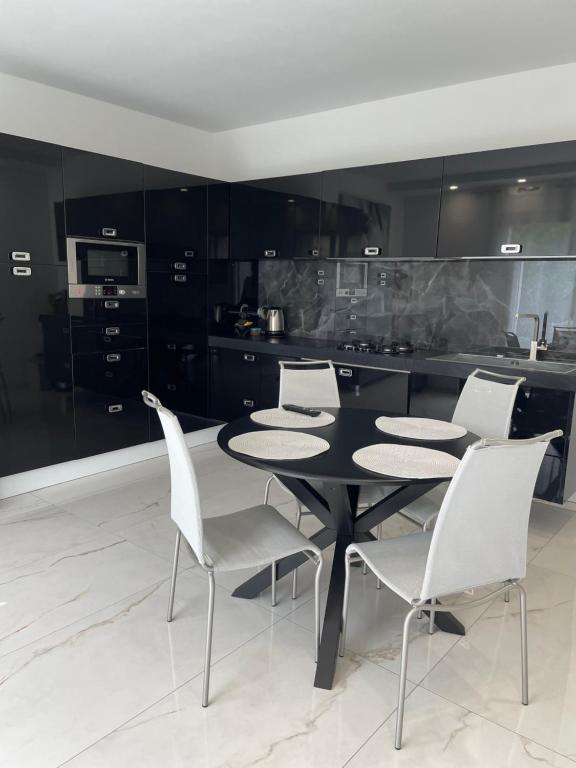 Kuchyň nebo kuchyňský kout v ubytování Casa M&N