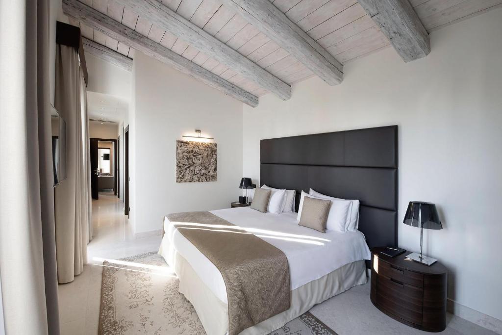 Postel nebo postele na pokoji v ubytování San Clemente Palace, Venice - Managed by Mandarin Oriental