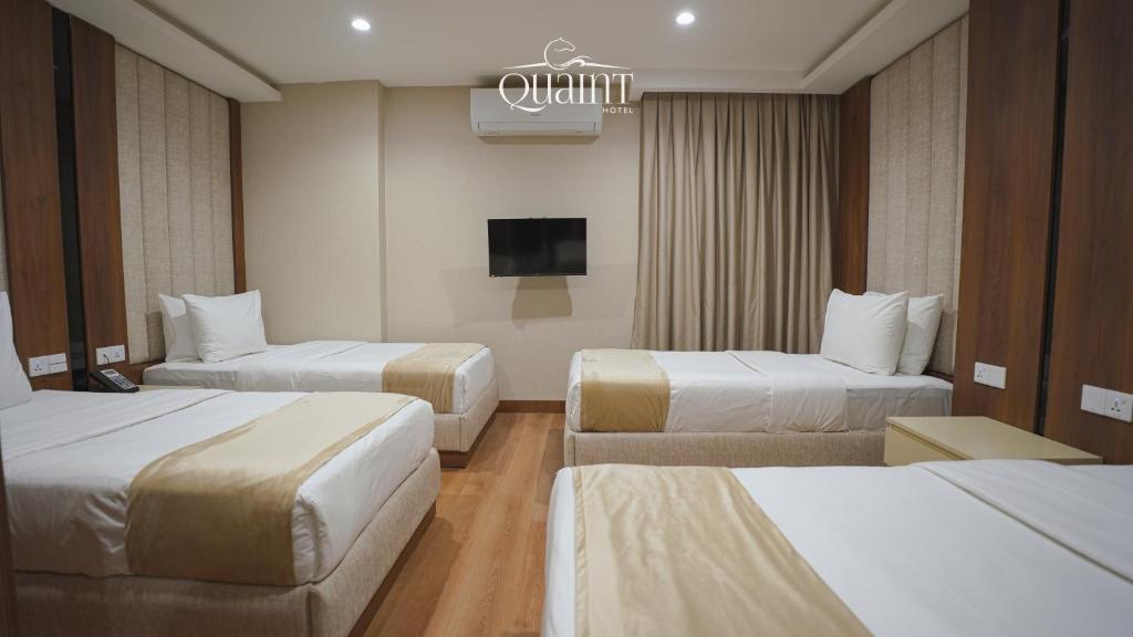 Postel nebo postele na pokoji v ubytování Quaint Hotel Erbil