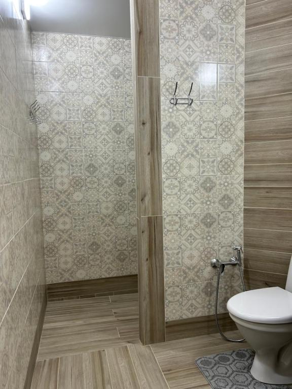 Koupelna v ubytování Гостьовий Дім Guest House