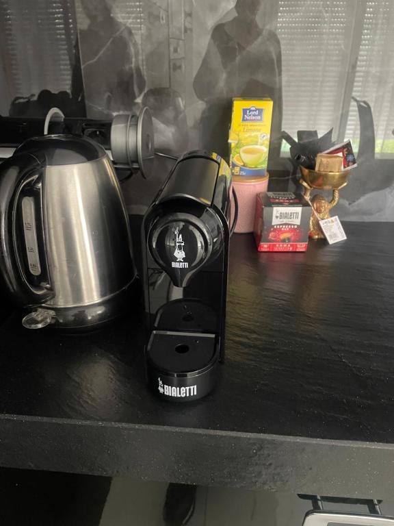 Příslušenství pro přípravu čaje a kávy v ubytování Casa M&N