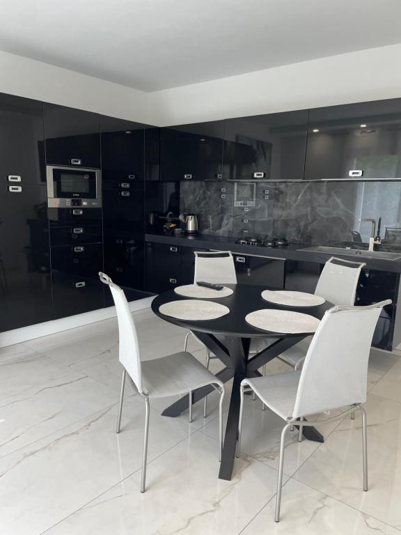 Kuchyň nebo kuchyňský kout v ubytování Casa M&N