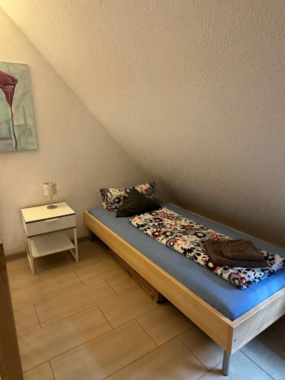 Postel nebo postele na pokoji v ubytování Pension LeLiLa Rust - ex Gästehaus Milella