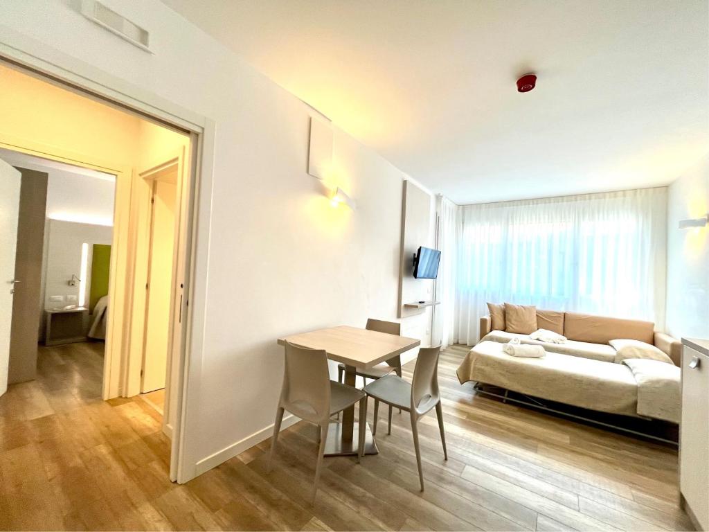 Postel nebo postele na pokoji v ubytování Park Hotel Pineta & Dependance Suite