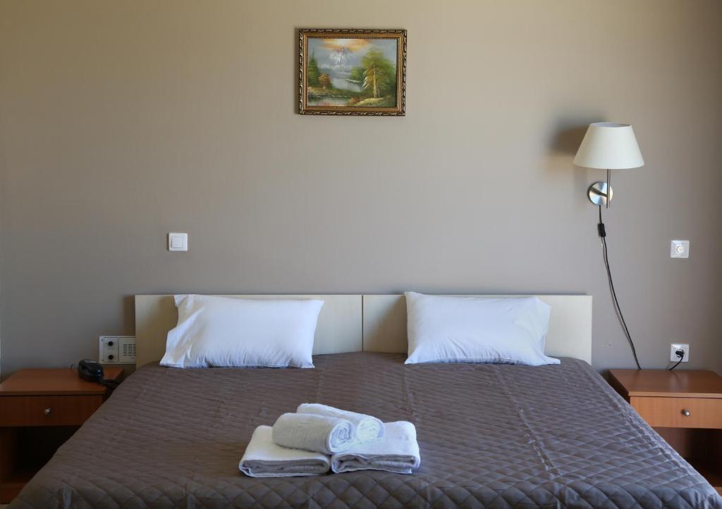 Postel nebo postele na pokoji v ubytování Hotel Sea Breeze