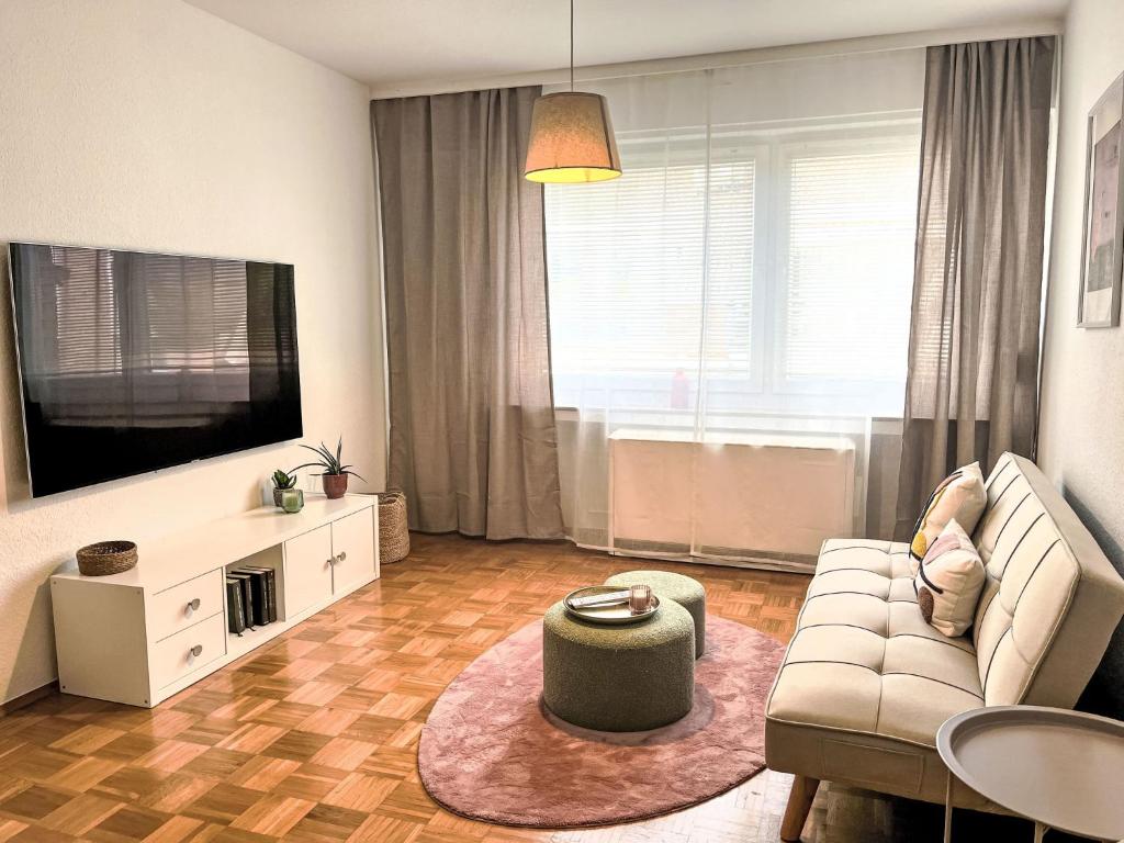 Μια τηλεόραση ή/και κέντρο ψυχαγωγίας στο Apartment Apartment Magdalena by Interhome