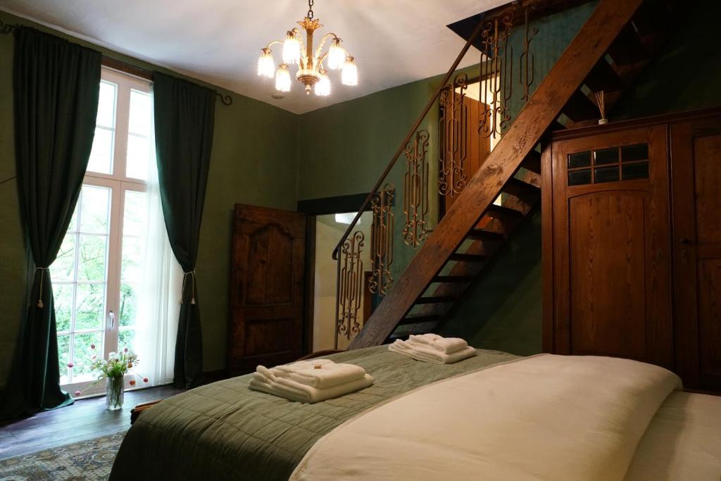 Postel nebo postele na pokoji v ubytování B&B Pronkenburg