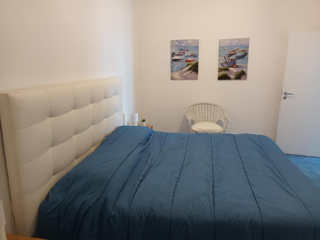 Ένα ή περισσότερα κρεβάτια σε δωμάτιο στο Casa Emi