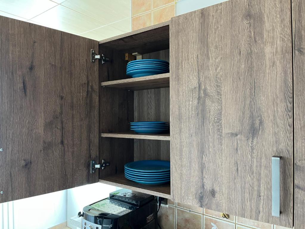 Kuchyň nebo kuchyňský kout v ubytování Apartman QUATTRO