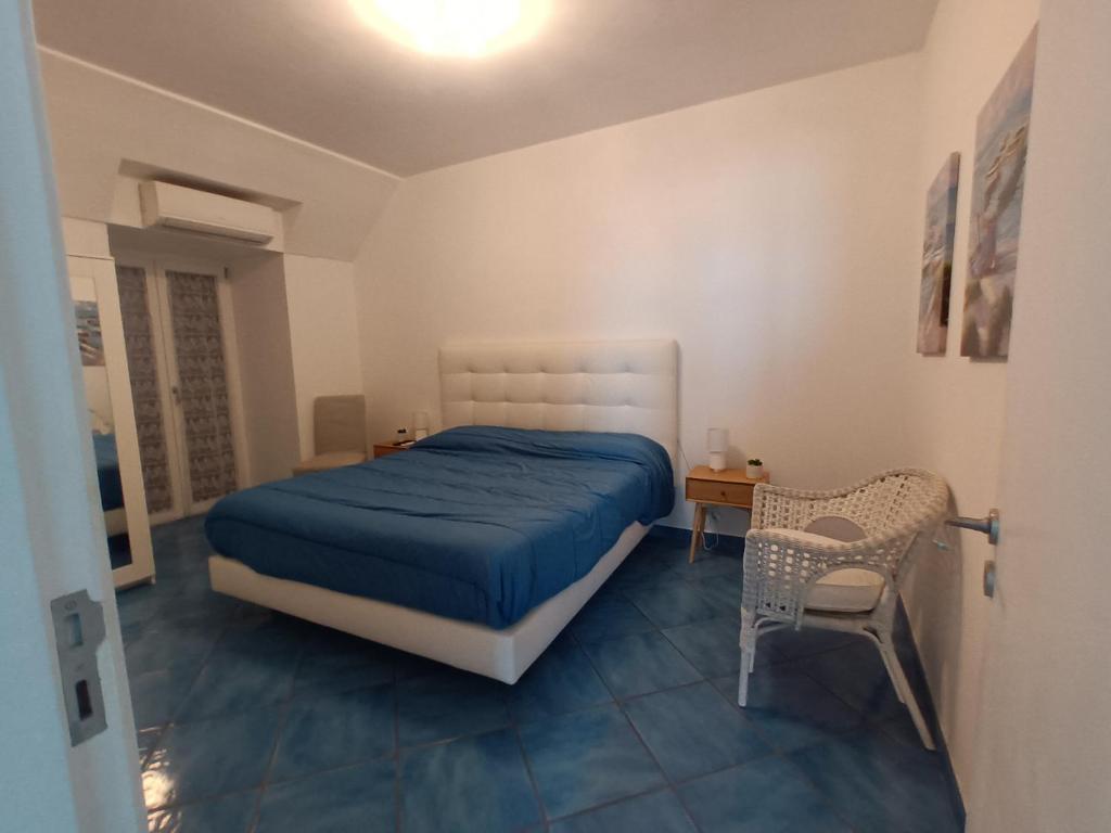 En eller flere senge i et værelse på Casa Emi