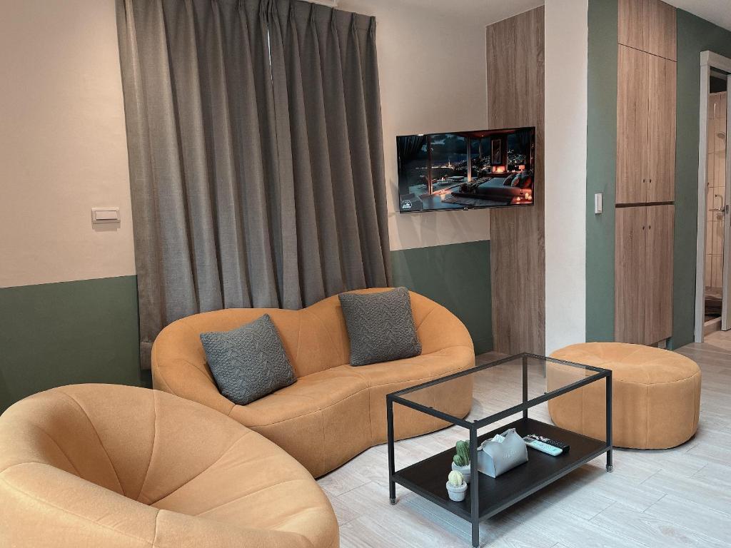 TV a/nebo společenská místnost v ubytování Minilove Homestay