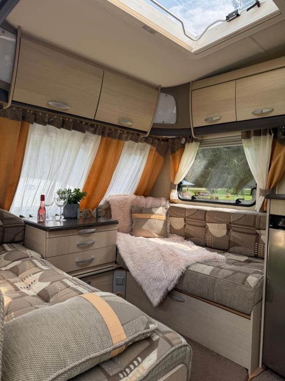 Posezení v ubytování Apusenia Caravan Escape Padiș - Glăvoi