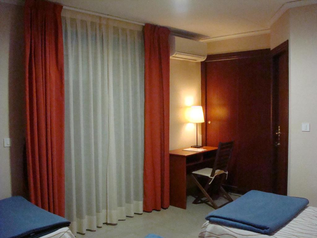 Postel nebo postele na pokoji v ubytování Hotel Fin De Semana