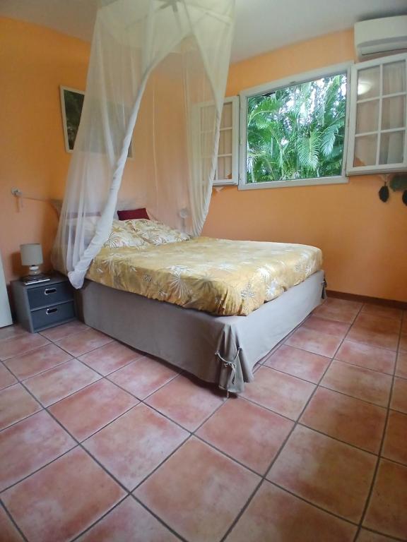 Postel nebo postele na pokoji v ubytování La Kaz Kako