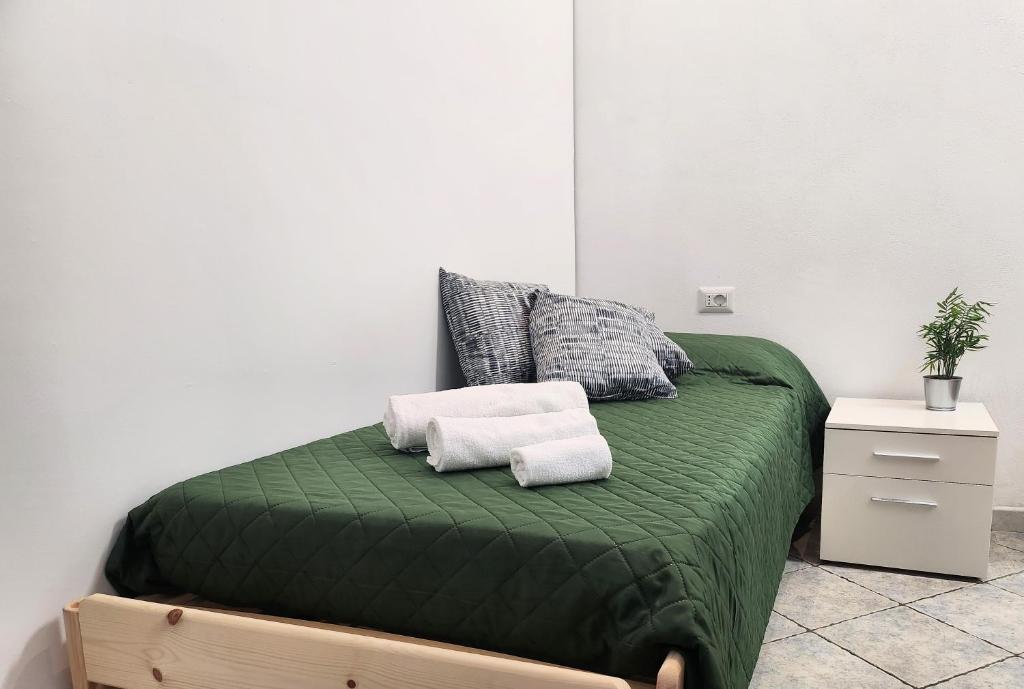 Postel nebo postele na pokoji v ubytování Al civico 10