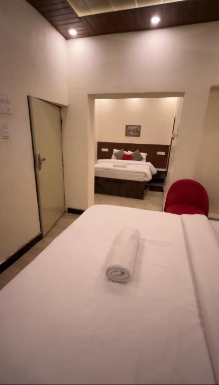 Postel nebo postele na pokoji v ubytování SK Residency