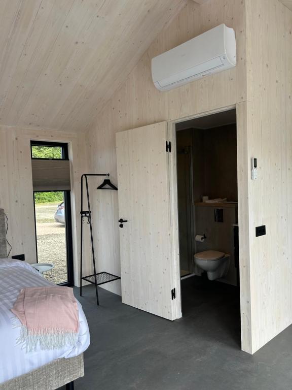 Postel nebo postele na pokoji v ubytování Hofstede Boterhoek