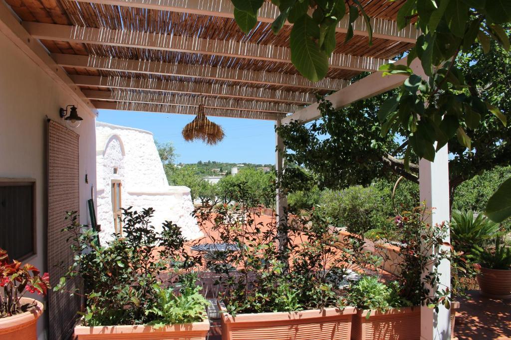 Zahrada ubytování Trullo Il Melograno