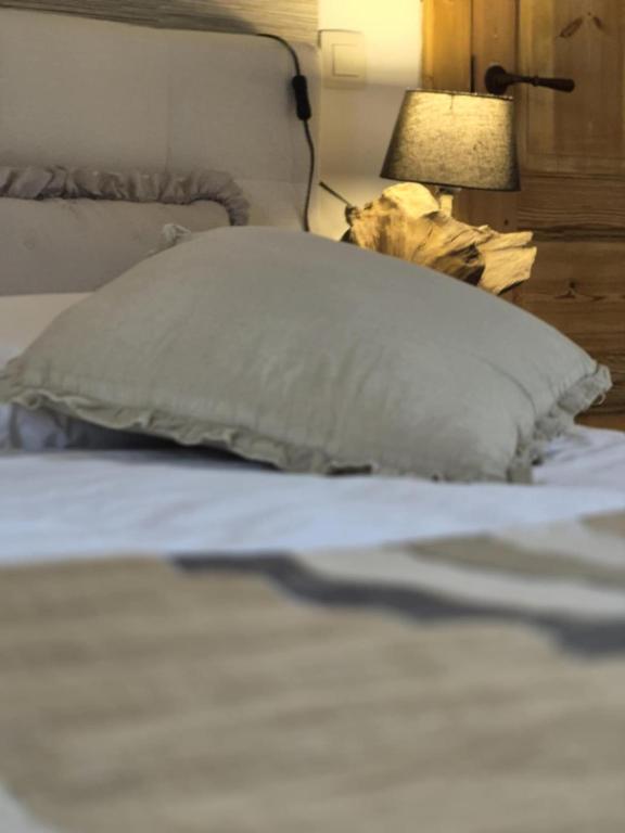 Postel nebo postele na pokoji v ubytování La Ferme de la Cour