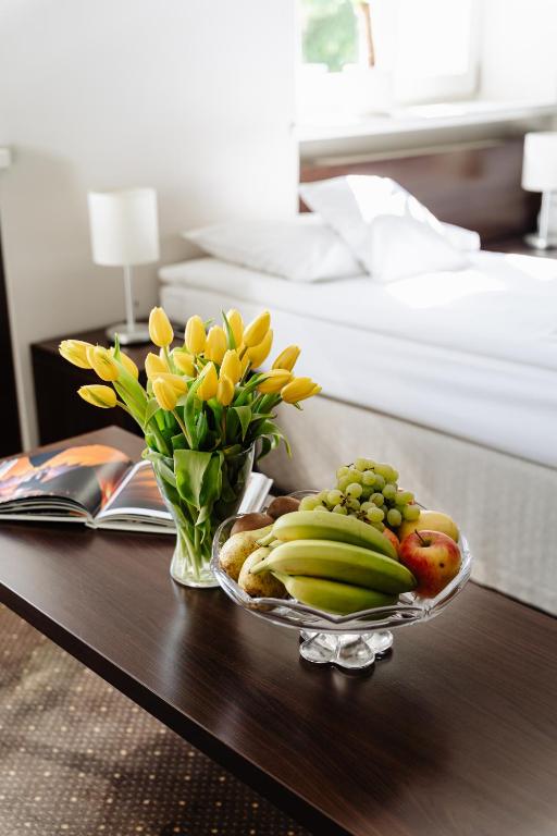 Posteľ alebo postele v izbe v ubytovaní B&B Wieniawa PARKING I ŚNIADANIE W CENIE! BREAKFAST AND PARKING INCLUDED!